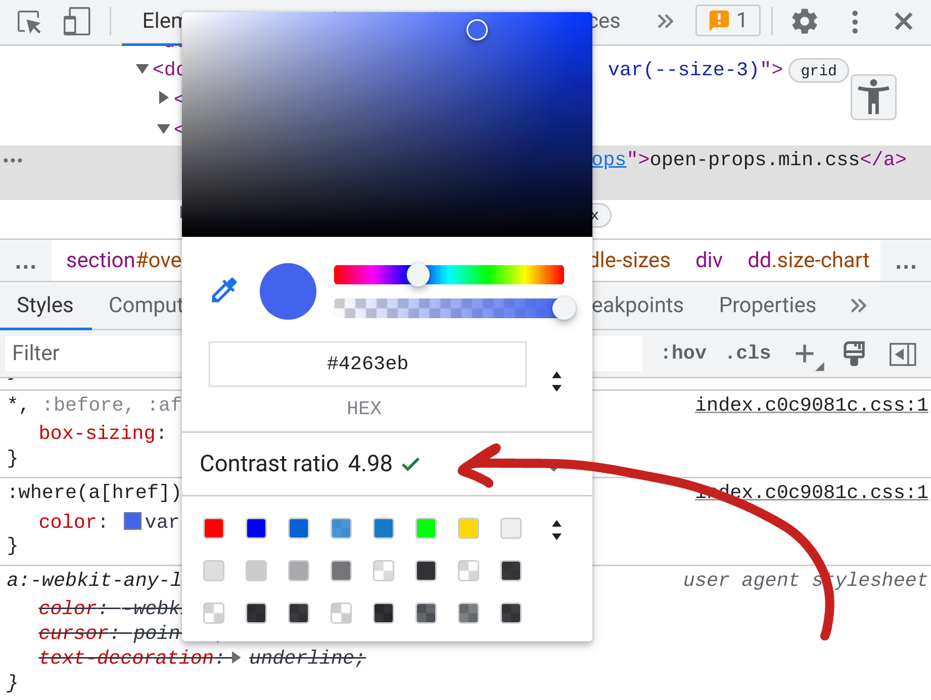 Captura de tela do painel "Elements" das ferramentas do desenvolvedor.Nos estilos, o seletor de cores é mostrado e, no meio, é informado o índice de contraste da cor de 4,98.